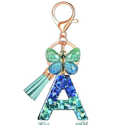 JINGUAZI Initial letter Keychains for Women Tassel Butterfly Pink Purple Cute Car Keychain for Wallet Backpack bag charm - color: A-blue Green