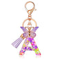JINGUAZI Initial letter Keychains for Women Tassel Butterfly Pink Purple Cute Car Keychain for Wallet Backpack bag charm - color: A-purple