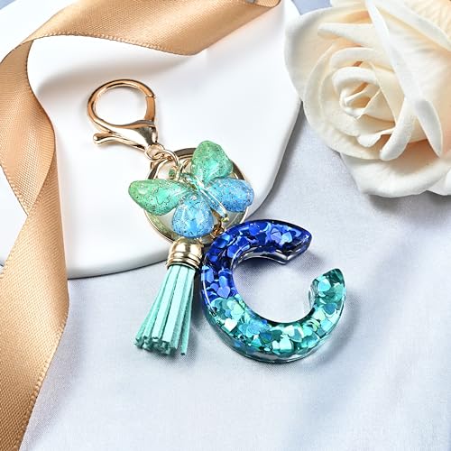 JINGUAZI Initial letter Keychains for Women Tassel Butterfly Pink Purple Cute Car Keychain for Wallet Backpack bag charm - color: C-blue Green