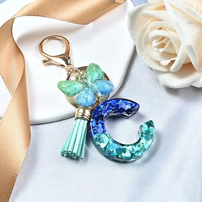 JINGUAZI Initial letter Keychains for Women Tassel Butterfly Pink Purple Cute Car Keychain for Wallet Backpack bag charm - color: C-blue Green