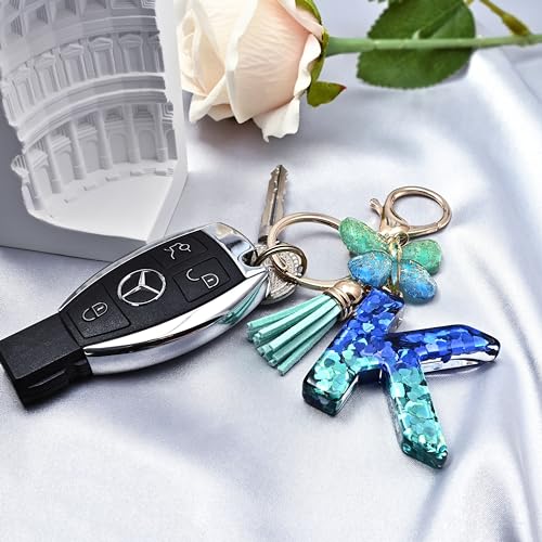 JINGUAZI Initial letter Keychains for Women Tassel Butterfly Pink Purple Cute Car Keychain for Wallet Backpack bag charm - color: C-blue Green