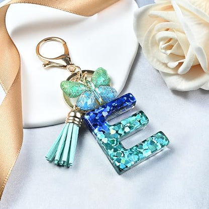 JINGUAZI Initial letter Keychains for Women Tassel Butterfly Pink Purple Cute Car Keychain for Wallet Backpack bag charm - color: E-blue Green